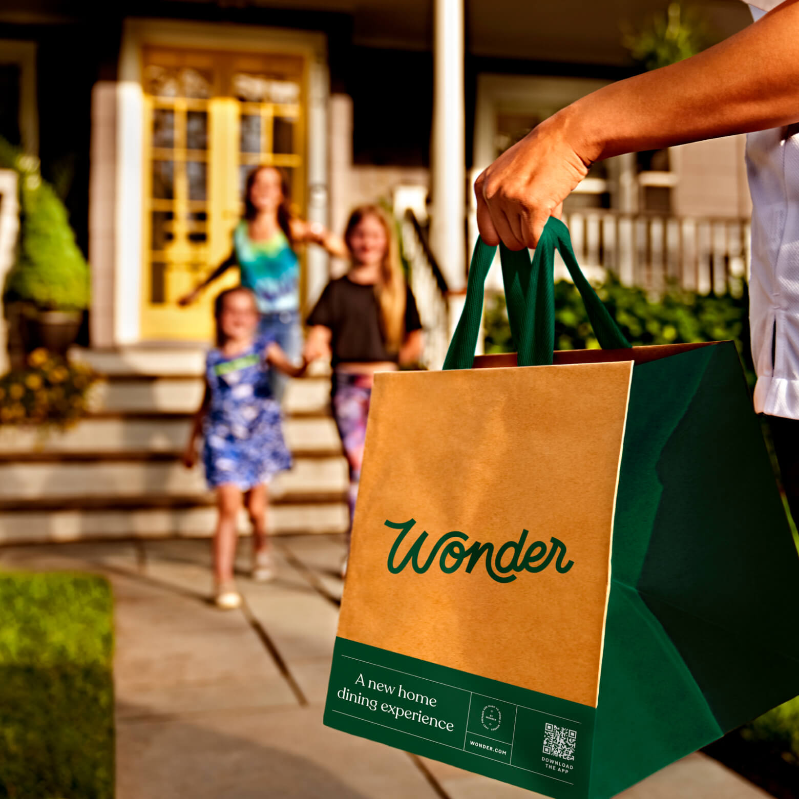 Family excitedly heading outside to pick up their Wonder delivery